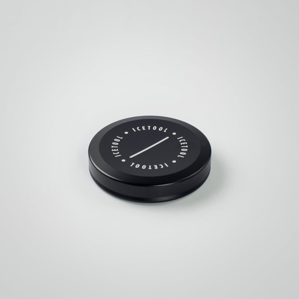 Icetool Mini Can made of black aluminum on a white background. A perfect container for nasal snus and snuff.