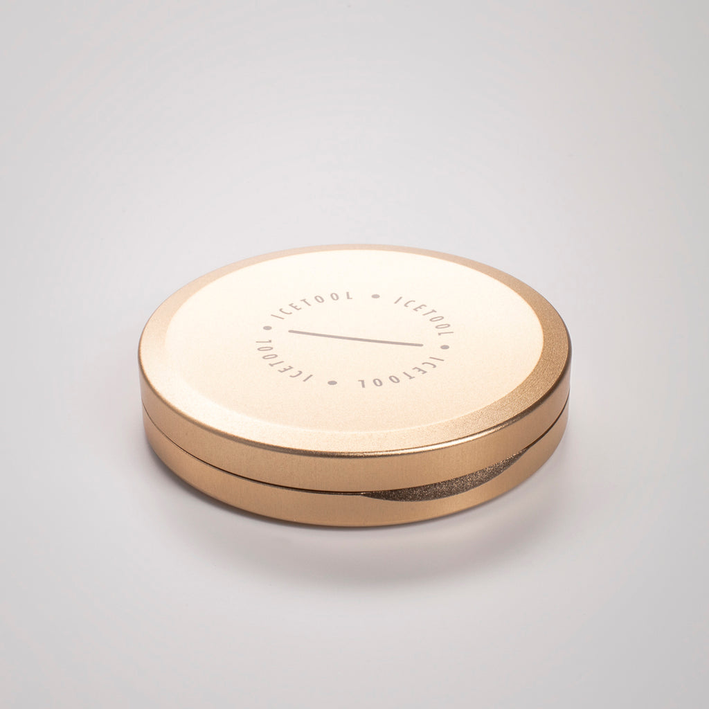 Icetool Slim Can for portion snus and nicotine pouches. Gold and champagne color anodised aluminum.